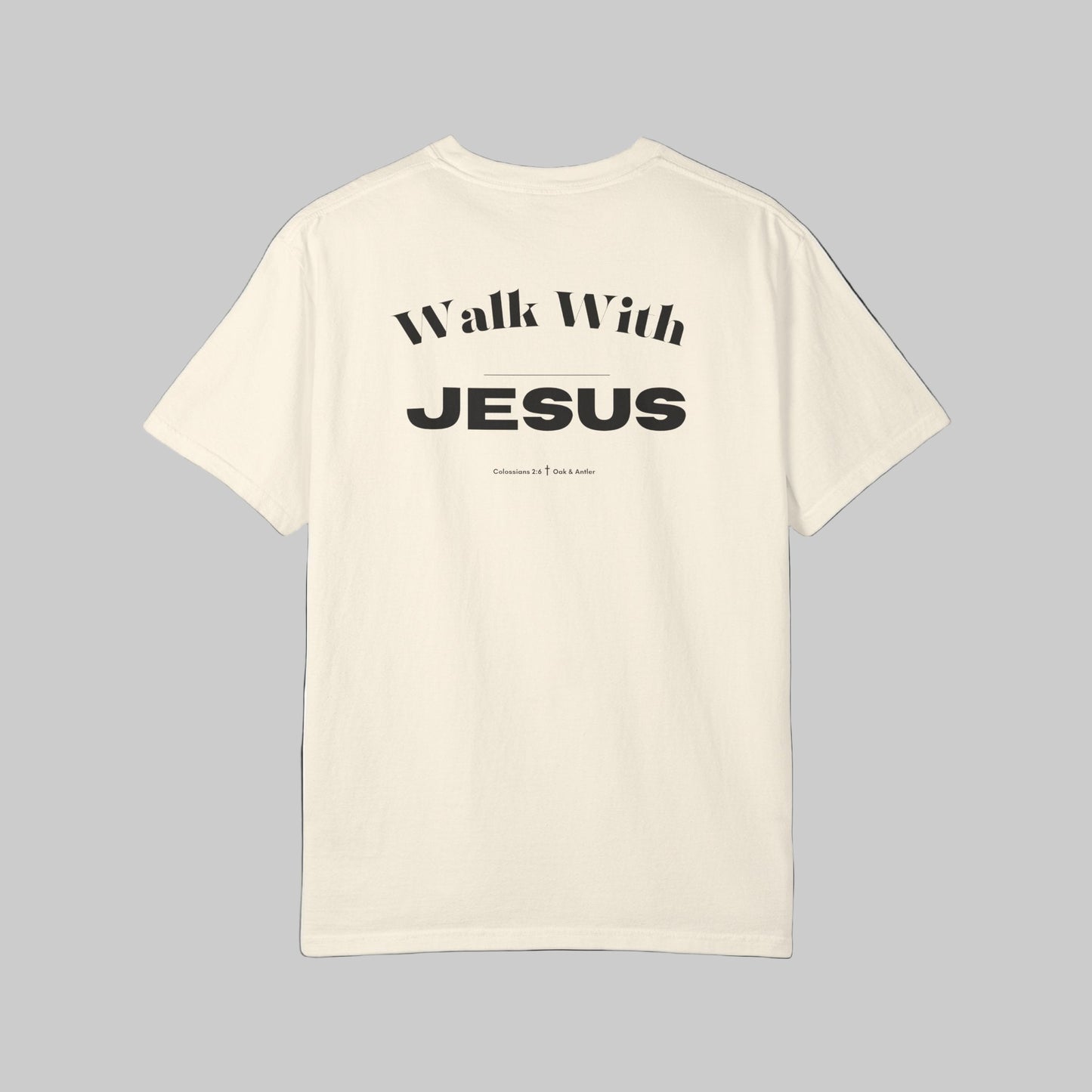 Beige t-shirt with 'Walk With JESUS' text on a white background